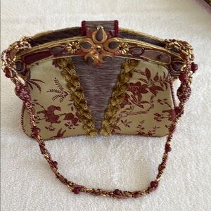 Gold and Red Clutch with Elegant Design